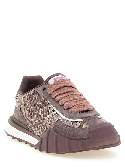 Athletic Sneakers by Dolce & Gabbana for women in tu viscose cotton & suede leather purple & floral features an exquisite silhouette, showcasing the premium low-top style of the Women's Low Top TU Viscose Cotton & Suede Leather Athletic Sneakers with an exquisite finish.