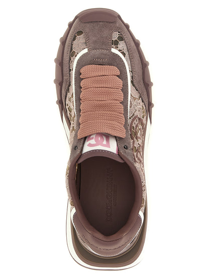 Athletic Sneakers by Dolce & Gabbana for women in tu viscose cotton & suede leather purple & floral showcases an impeccable silhouette, defined by an impeccable low-top style design that perfectly captures the essence of the Women's Low Top TU Viscose Cotton & Suede Leather Athletic Sneakers.