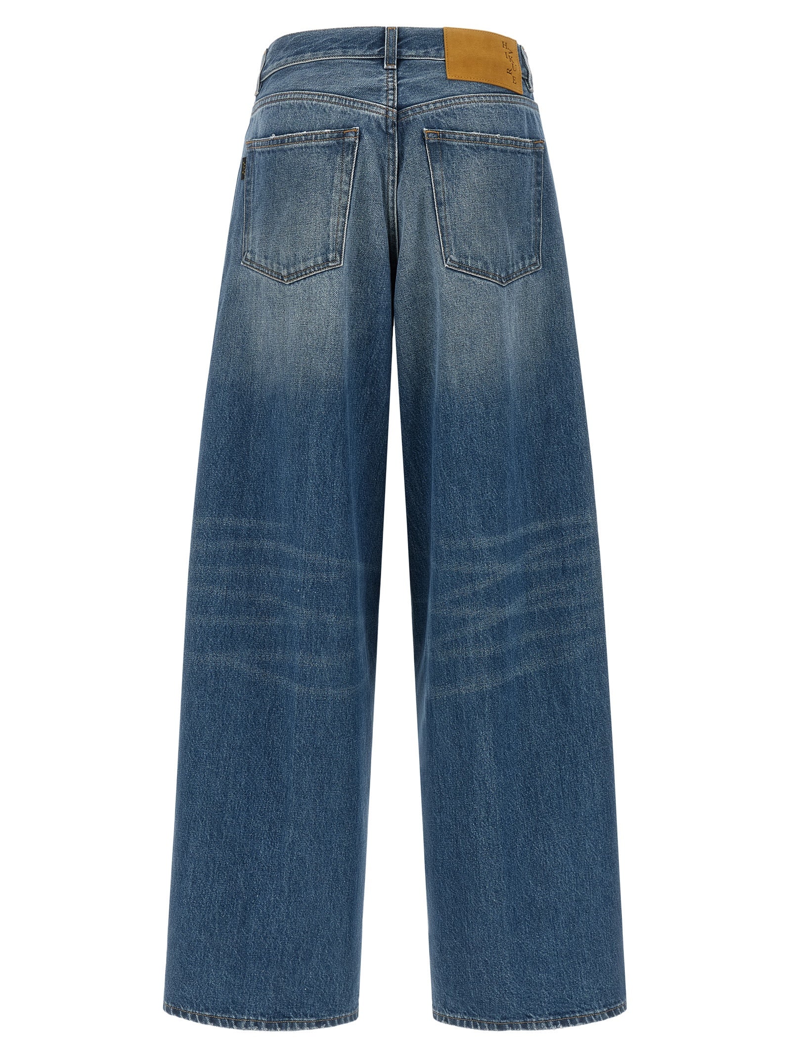 Jeans by Haikure for women in cotton denim blue features a polished silhouette with a polished relaxed-fit & wide, reaching a polished long and finished with a polished .