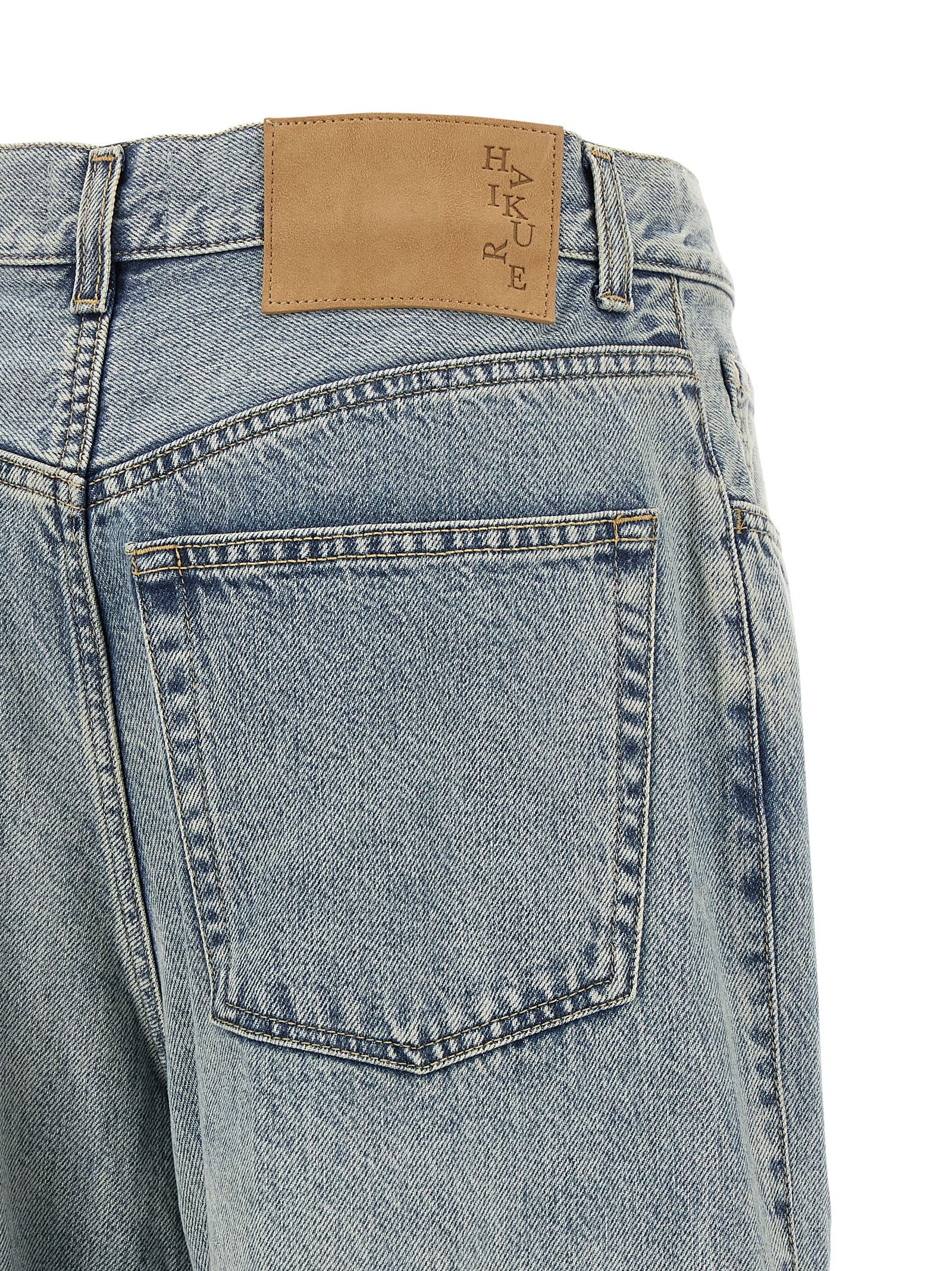 Jeans by Haikure for women in stretch lyocell denim cotton light-blue presents a refined pantology silhouette, artfully defined by a refined pantology wide, long, and a sophisticated .