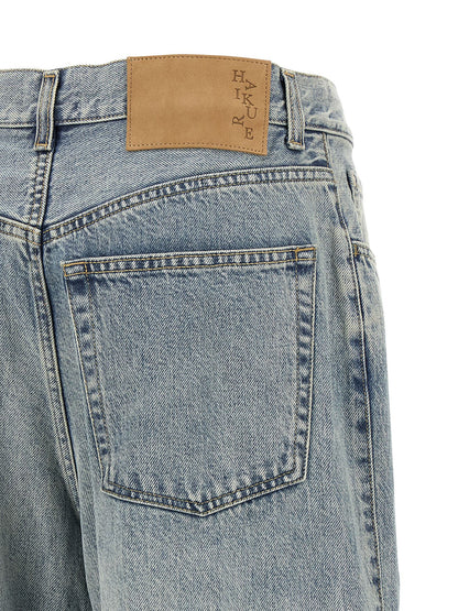 Jeans by Haikure for women in stretch lyocell denim cotton light-blue presents a refined pantology silhouette, artfully defined by a refined pantology wide, long, and a sophisticated .