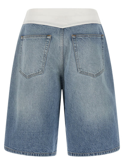 Denim Shorts by MM6 Maison Margiela for women in denim cotton light-blue, white & signature features an utilitarian chic with a short and , creating a utilitarian chic silhouette perfect for elevated casual styling.