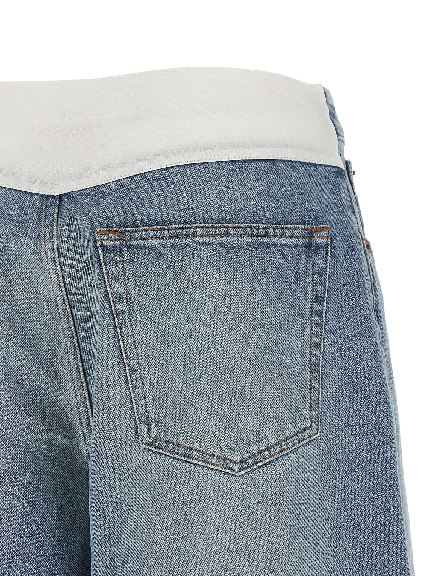 Denim Shorts by MM6 Maison Margiela for women in denim cotton light-blue, white & signature presents a contemporary silhouette, featuring a contemporary and short with a contemporary for a sophisticated summer look.