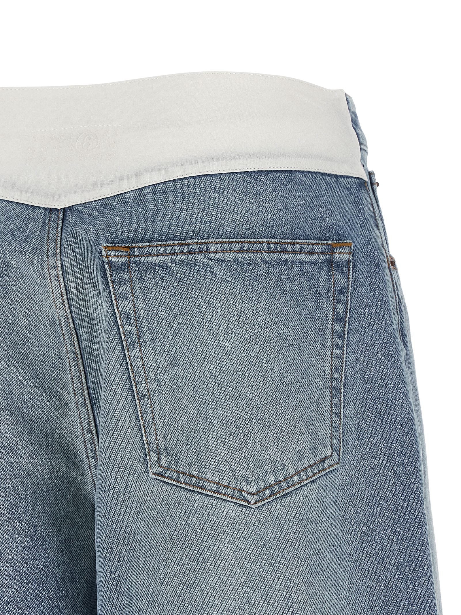 Denim Shorts by MM6 Maison Margiela for women in denim cotton light-blue, white & signature presents a contemporary silhouette, featuring a contemporary and short with a contemporary for a sophisticated summer look.