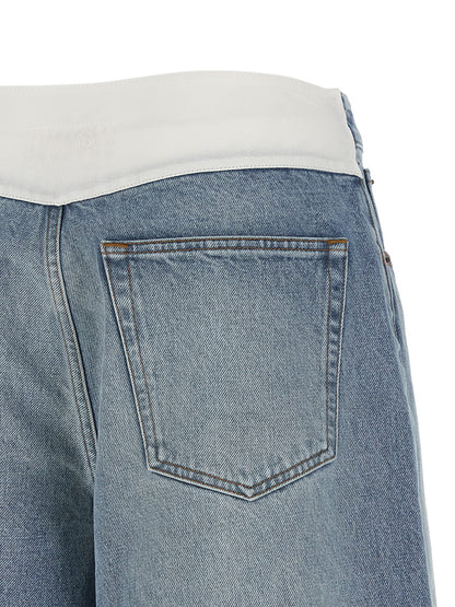 Denim Shorts by MM6 Maison Margiela for women in denim cotton light-blue, white & signature presents a contemporary silhouette, featuring a contemporary and short with a contemporary for a sophisticated summer look.