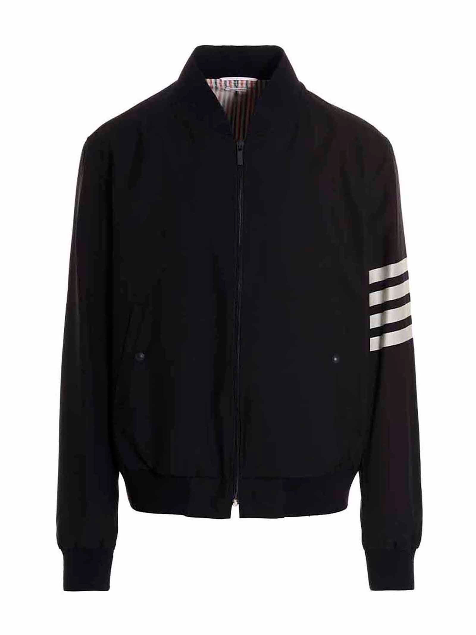 Bomber Jacket by Thom Browne for men in wool blue presents a effortlessly chic silhouette, showcasing a sophisticated and premium pockets for a truly effortlessly chic finish.