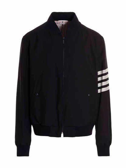 Bomber Jacket by Thom Browne for men in wool blue presents a effortlessly chic silhouette, showcasing a sophisticated and premium pockets for a truly effortlessly chic finish.