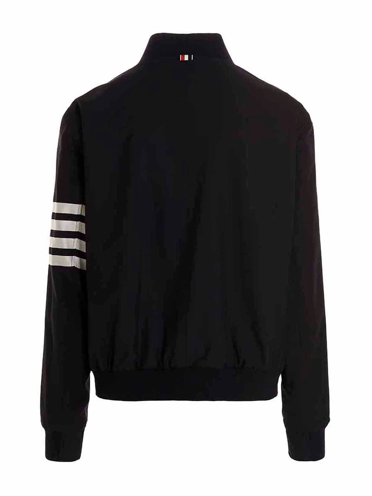 Bomber Jacket by Thom Browne for men in wool blue features an contemporary silhouette, showcasing a sophisticated and contemporary pockets for a truly refined look.