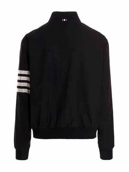 Bomber Jacket by Thom Browne for men in wool blue features an contemporary silhouette, showcasing a sophisticated and contemporary pockets for a truly refined look.