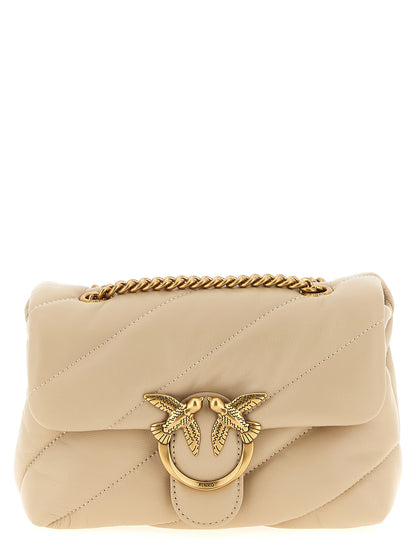 Mini 2-in-1 Shoulder & Crossbody Flap Handbag by PINKO for women in nappa & suede lamb leather beige & signature features a transformative elegance silhouette, showcasing a secure flap, magnetic & buckle, organized , and versatile crossbody-strap & shoulder-strap for a transformative elegance look.