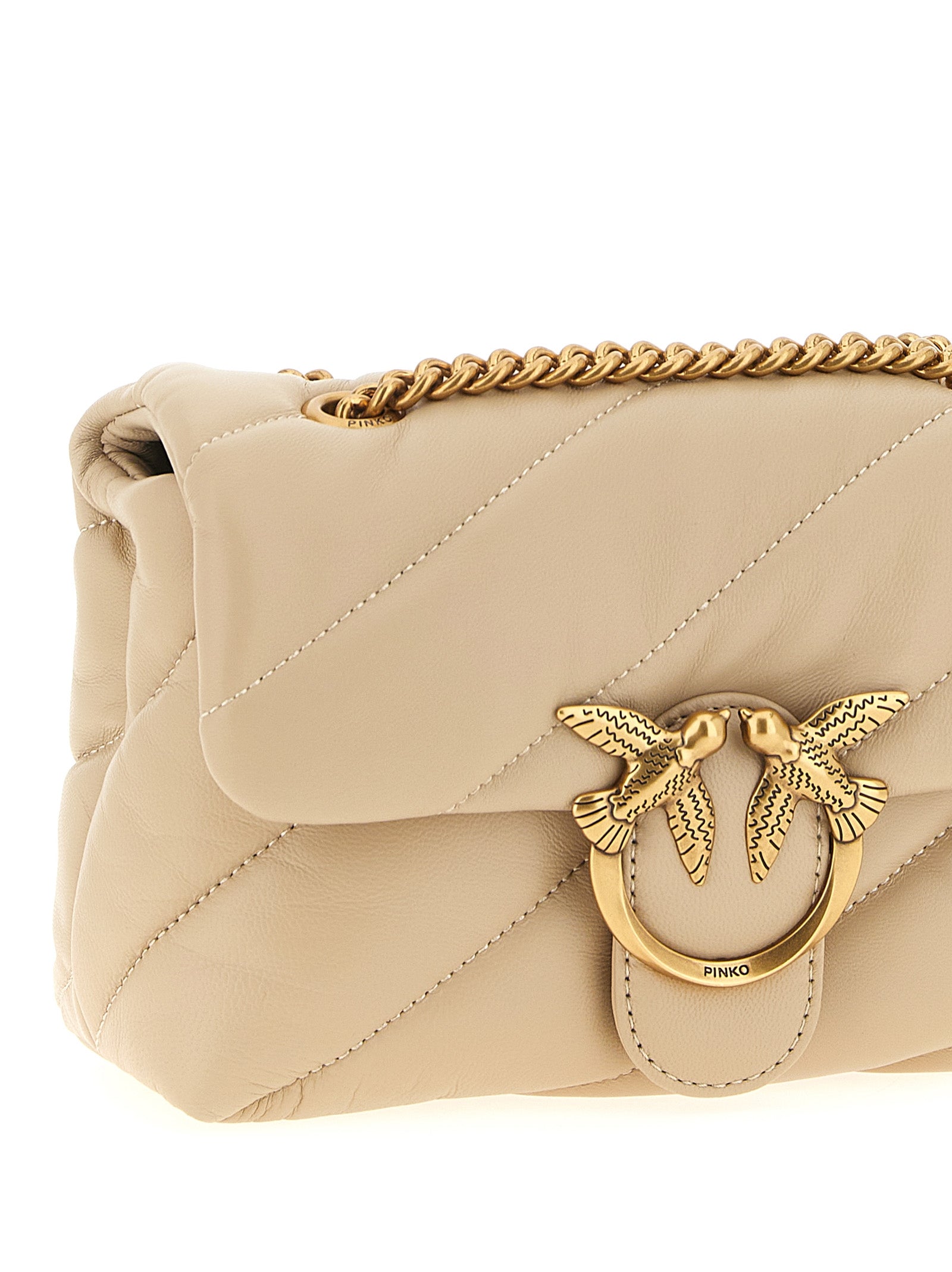 Mini 2-in-1 Shoulder & Crossbody Flap Handbag by PINKO for women in nappa & suede lamb leather beige & signature features a versatile chic silhouette, meticulously detailed with a secure flap, magnetic & buckle, ample , and versatile crossbody-strap & shoulder-strap.