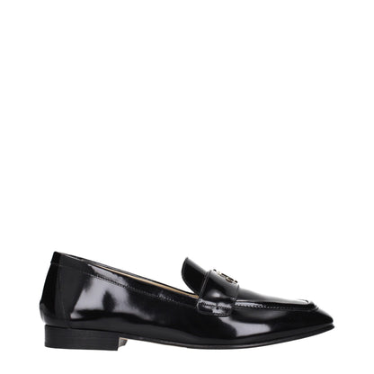 Flat Loafer Slip-On Shoes by Jimmy Choo for women in leather black features an effortless chic silhouette, showcasing the Women's Leather Flat Loafer Slip-On Shoes design with an effortless chic flat and a for a effortless chic look.