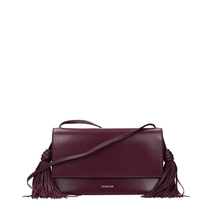 Crossbody Handbag by Jil Sander for women in leather red features an multi-faceted design with a secure , ample , and versatile crossbody-strap for a multi-faceted finish.