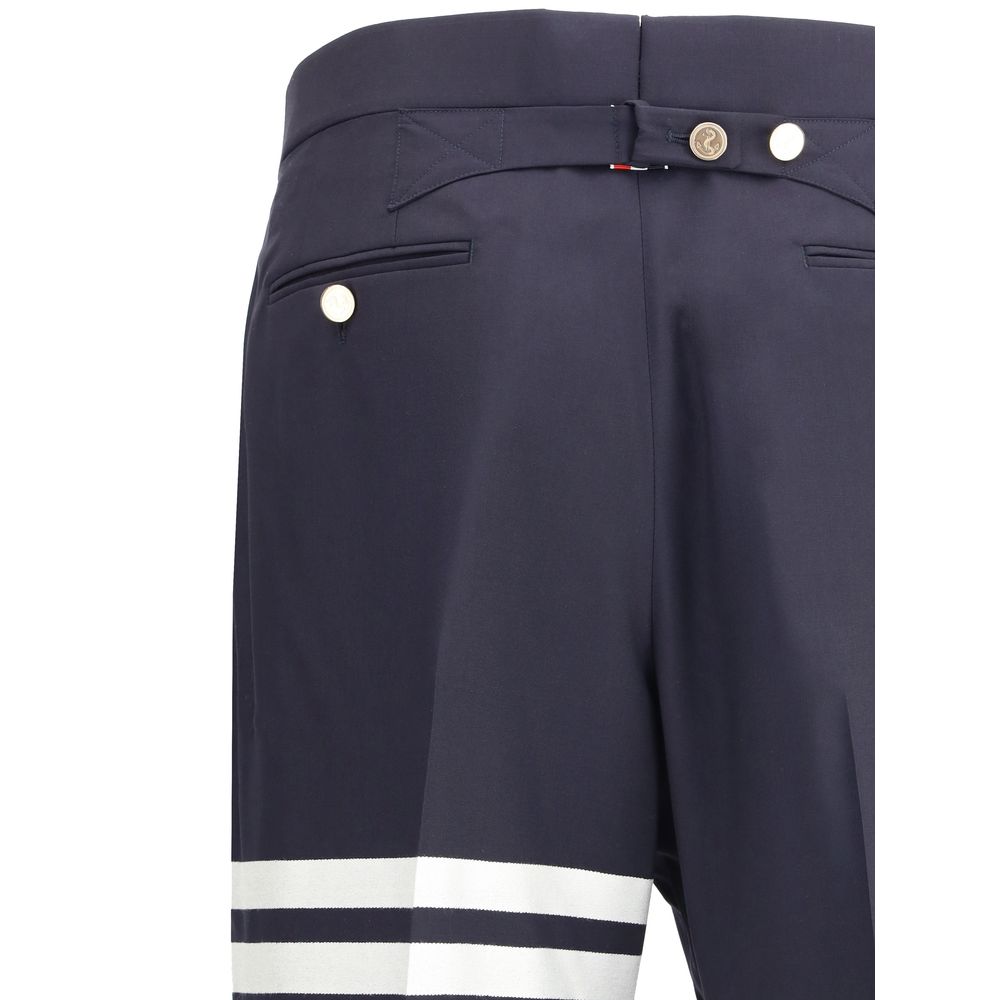 Pants by Thom Browne for men in wool blue features a enduring silhouette, showcasing a enduring regular-fit and long with a for a premium, tailored aesthetic.