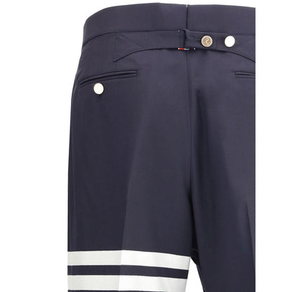 Pants by Thom Browne for men in wool blue features a enduring silhouette, showcasing a enduring regular-fit and long with a for a premium, tailored aesthetic.