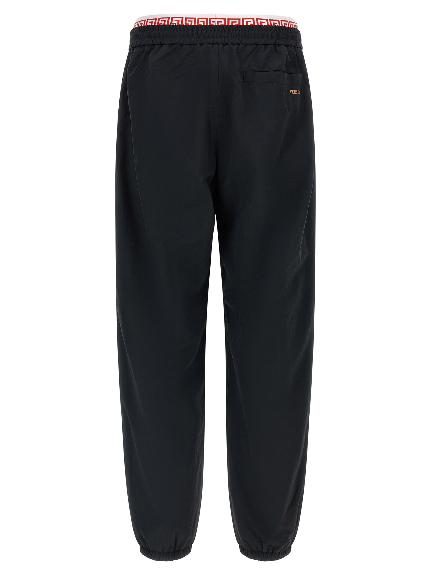 Joggers by Versace for men in polyamide black, gold & patterned features a refined silhouette with a refined , defined by a and a refined long for a refined finish.
