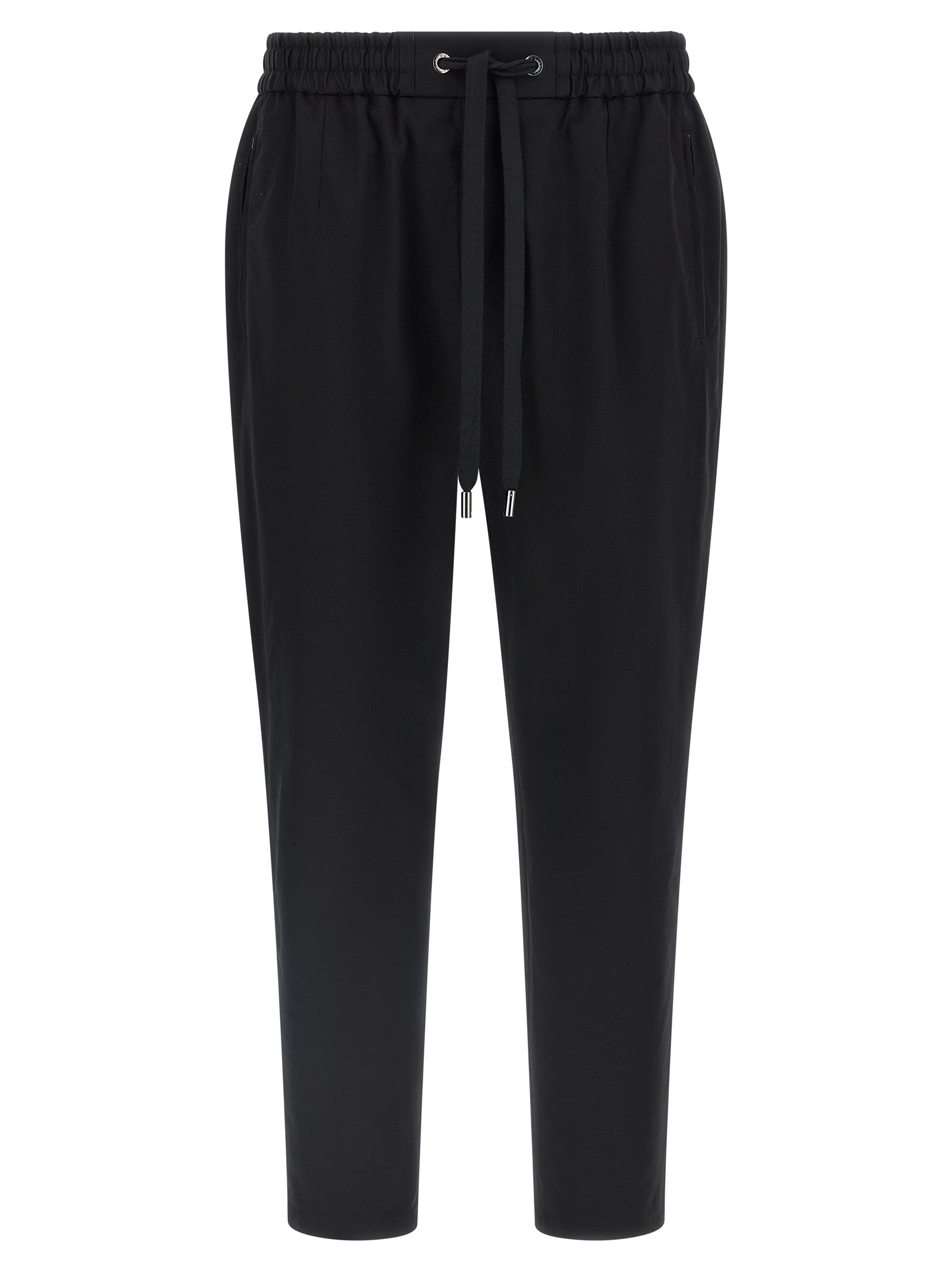 Casual Pants by Dolce & Gabbana for men in stretch cotton black presents a refined pantology silhouette, artfully defined by a refined pantology tapered-leg, long, and a sophisticated .