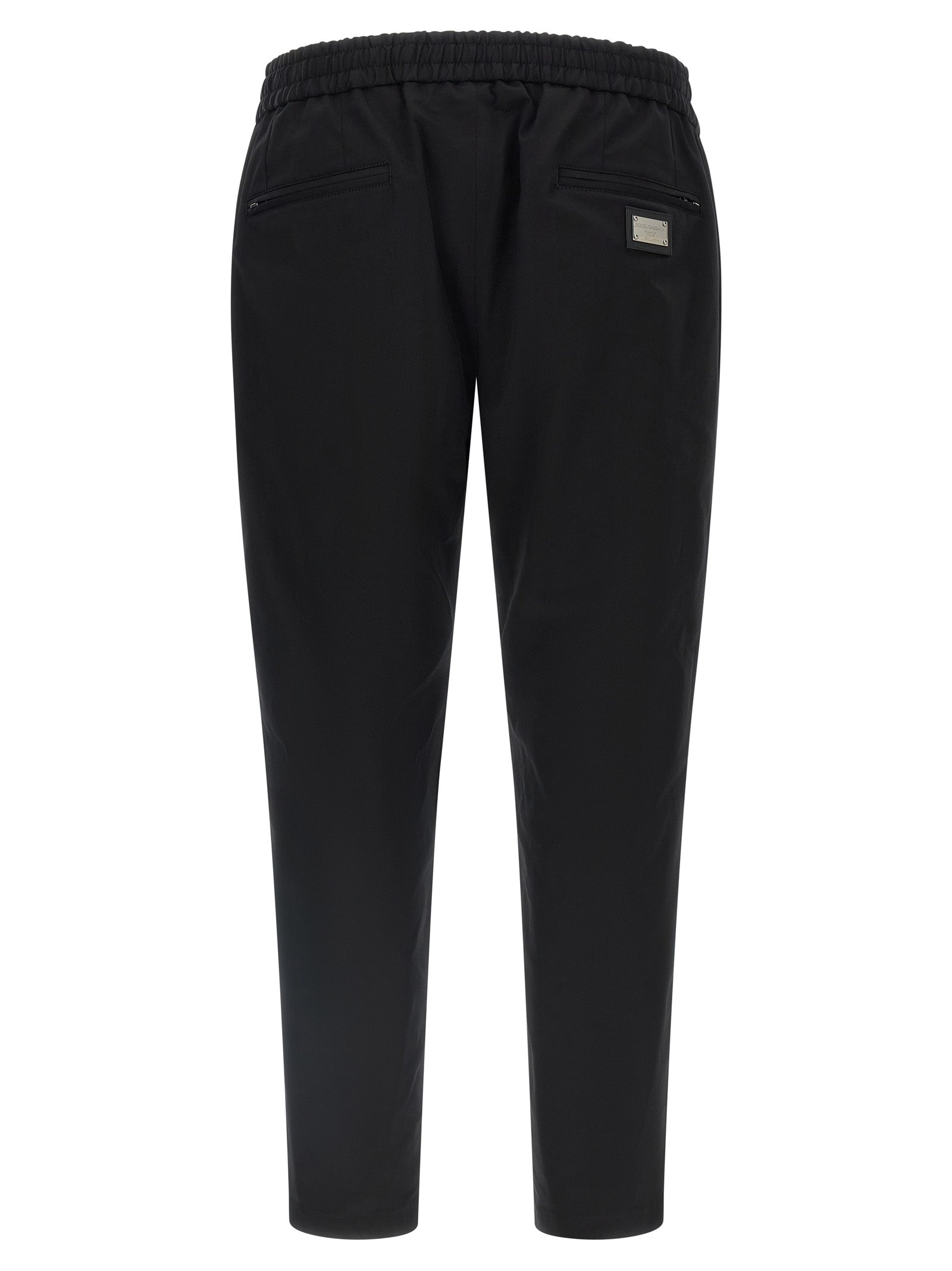 Casual Pants by Dolce & Gabbana for men in stretch cotton black features an sophisticated and tapered-leg with a precise long, creating a sophisticated and sophisticated silhouette.