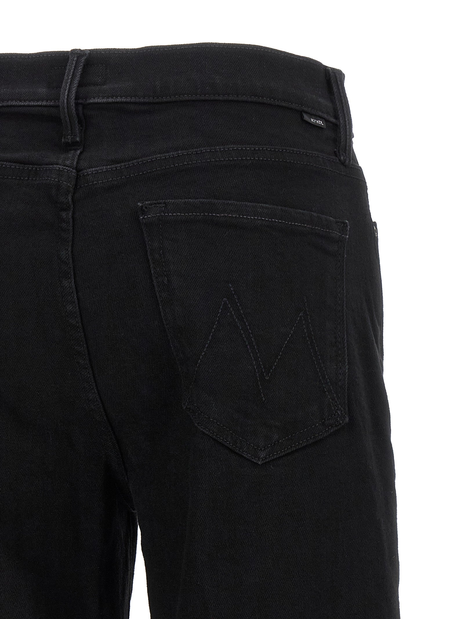 Jeans by Mother Denim for women in stretch denim cotton black presents a refined pantology silhouette, artfully defined by a refined pantology straight-leg & flared, long, and a sophisticated high rise.