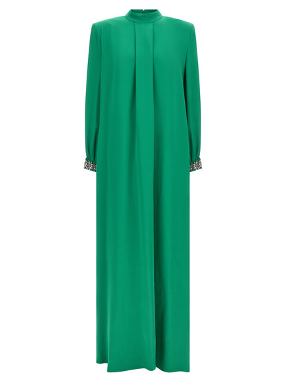 Dress by Valentino Garavani for women in silk & rhinestone bicolour & green features an magnificent silhouette, artfully detailed with a magnificent and that flows into an magnificent long.
