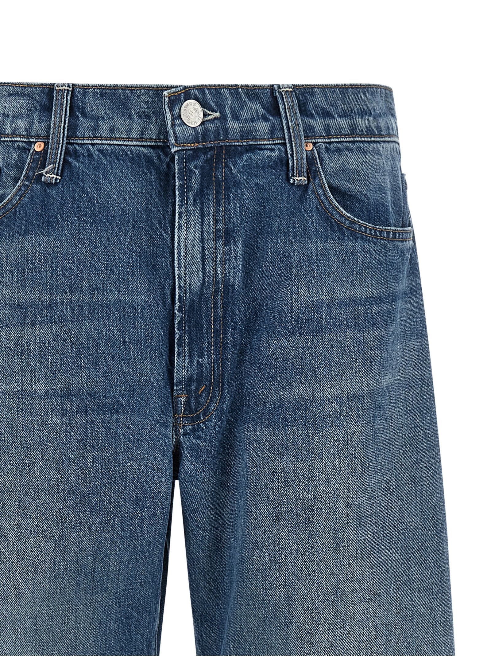 Jeans by Mother Denim for women in denim cotton blue features a polished silhouette with a polished relaxed-fit & oversized, reaching a polished long and finished with a polished .