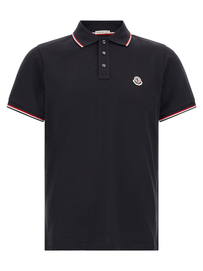 Polo Shirt by Moncler for men in cotton felt navy & striped presents a crisp silhouette, artfully detailed with a crisp and crisp .