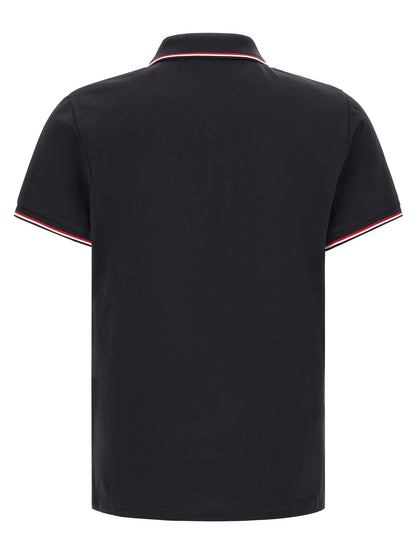Polo Shirt by Moncler for men in cotton felt navy & striped presents a distinguished silhouette, showcasing a sophisticated and distinguished for a truly distinguished finish.