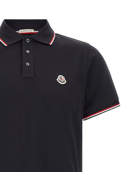 Polo Shirt by Moncler for men in cotton felt navy & striped showcases a sharp silhouette, detailed with a refined and sharp for a sophisticated finish.