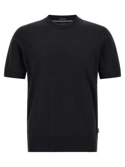 T-Shirt by Hugo Boss for men in merino virgin wool black, natural & striped showcases a fashionable silhouette, elegantly detailed with a fashionable and crew neckline for a sophisticated, high-fashion look.