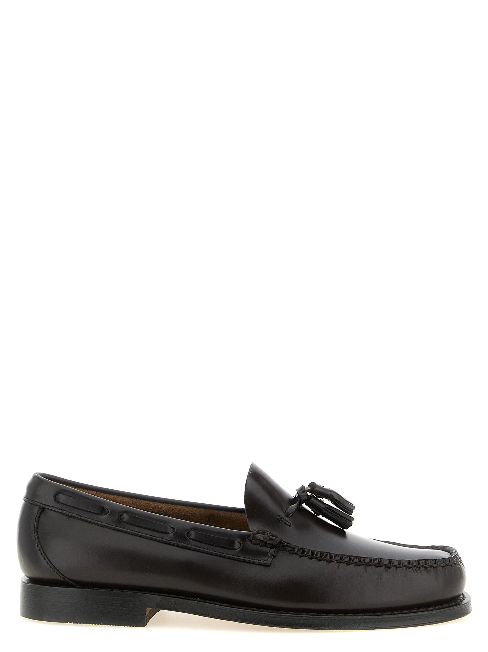 Loafer Slip-On Shoes by G.H. BASS for men in cowhide leather black, brown & gold features an effortless chic silhouette, showcasing the Men's Cowhide Leather Loafer Slip-On Shoes design with an effortless chic and a moc toe style for a effortless chic look.