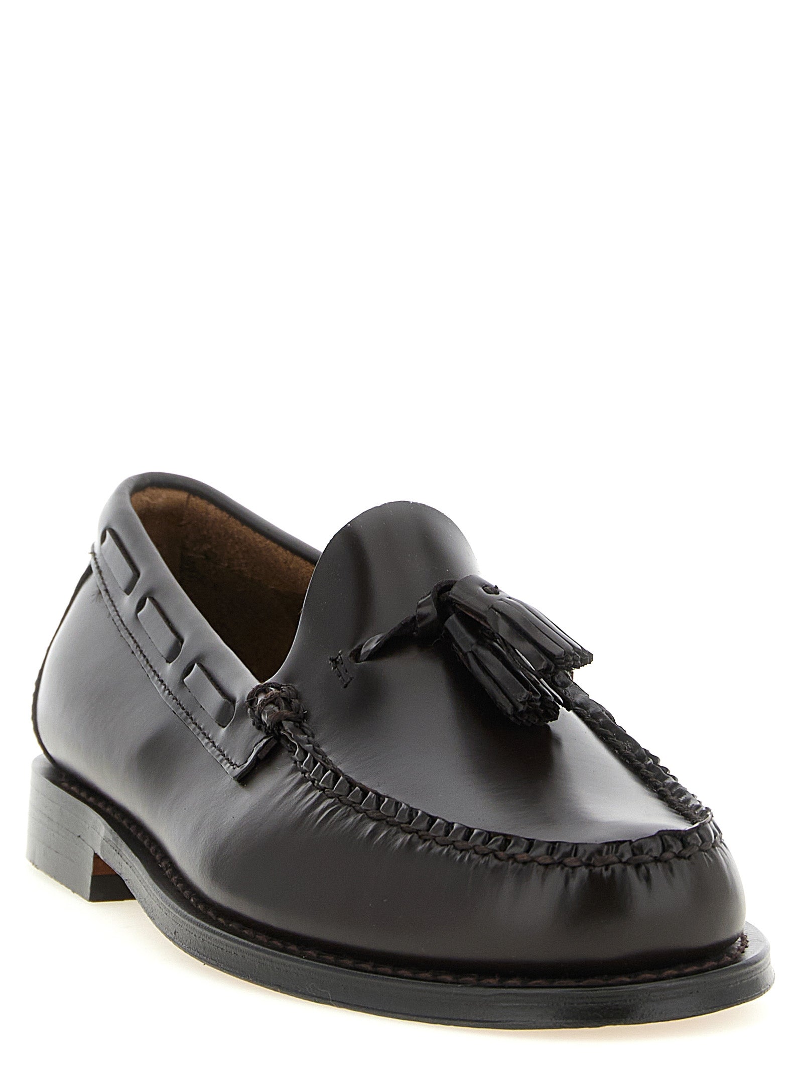 Loafer Slip-On Shoes by G.H. BASS for men in cowhide leather black, brown & gold showcases a impeccable silhouette as Men's Cowhide Leather Loafer Slip-On Shoes, artfully designed with a impeccable and refined moc toe style for a impeccable finish.