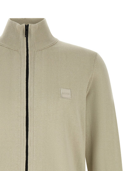 Cardigan by Hugo Boss for men in cashmere cotton blend beige, black & sand showcases a luxurious silhouette, meticulously detailed with a sophisticated high-neck neckline and for a refined finish.