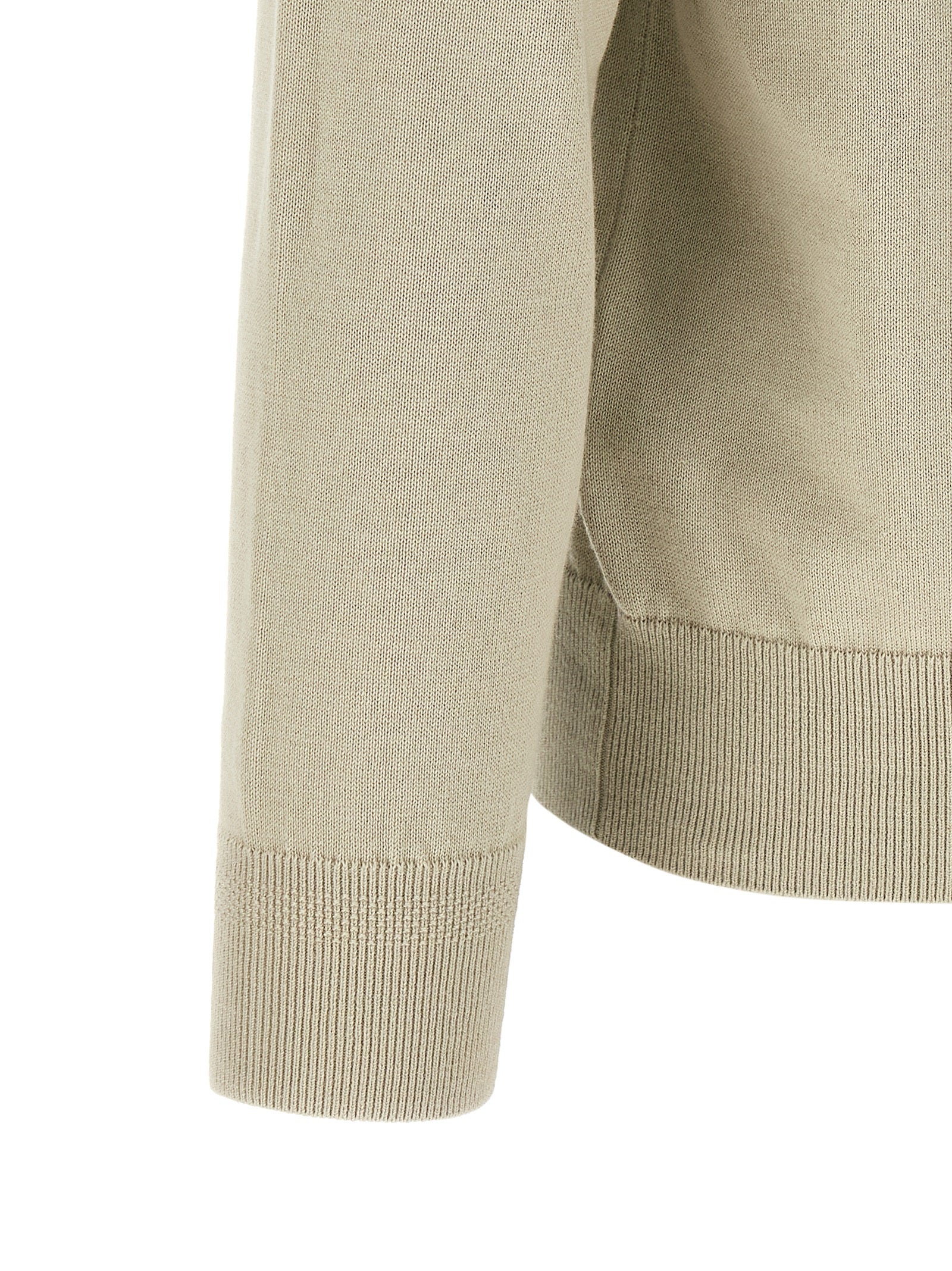 Cardigan by Hugo Boss for men in cashmere cotton blend beige, black & sand features a dramatic silhouette, showcasing a sophisticated and dramatic detail for a timeless, premium look.