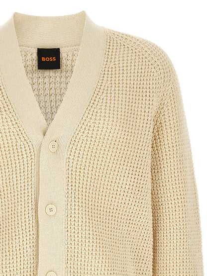 Cardigan by Hugo Boss for men in cotton polyester beige, natural & patterned showcases a luxurious silhouette, meticulously detailed with a sophisticated v-neck neckline and for a refined finish.