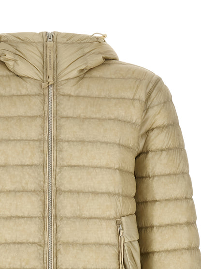 Hooded Puffer Jacket by C.P. Company for men in polyamide beige & sand features a city-ready silhouette, detailed with pockets, hooded & insulated and a city-ready hooded neckline.