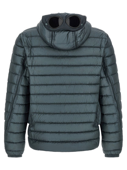 This Hooded Puffer Jacket by C.P. Company for men in polyamide blue & teal exhibits a edgy silhouette, meticulously detailed with functional hooded & insulated and a edgy hooded neckline for a edgy finish.