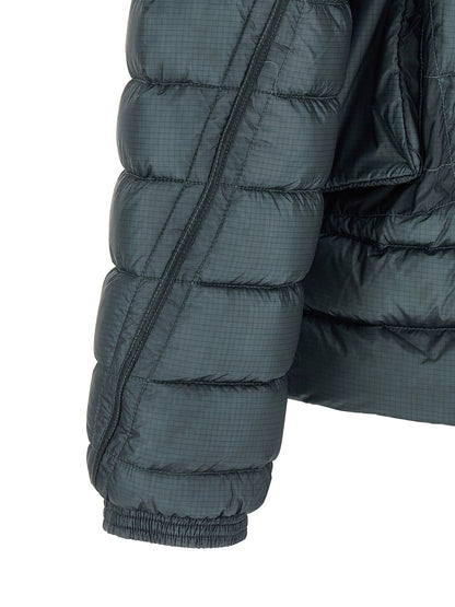 Hooded Puffer Jacket by C.P. Company for men in polyamide blue & teal features an contemporary silhouette, showcasing a sophisticated hooded neckline and contemporary hooded & insulated for a truly refined look.