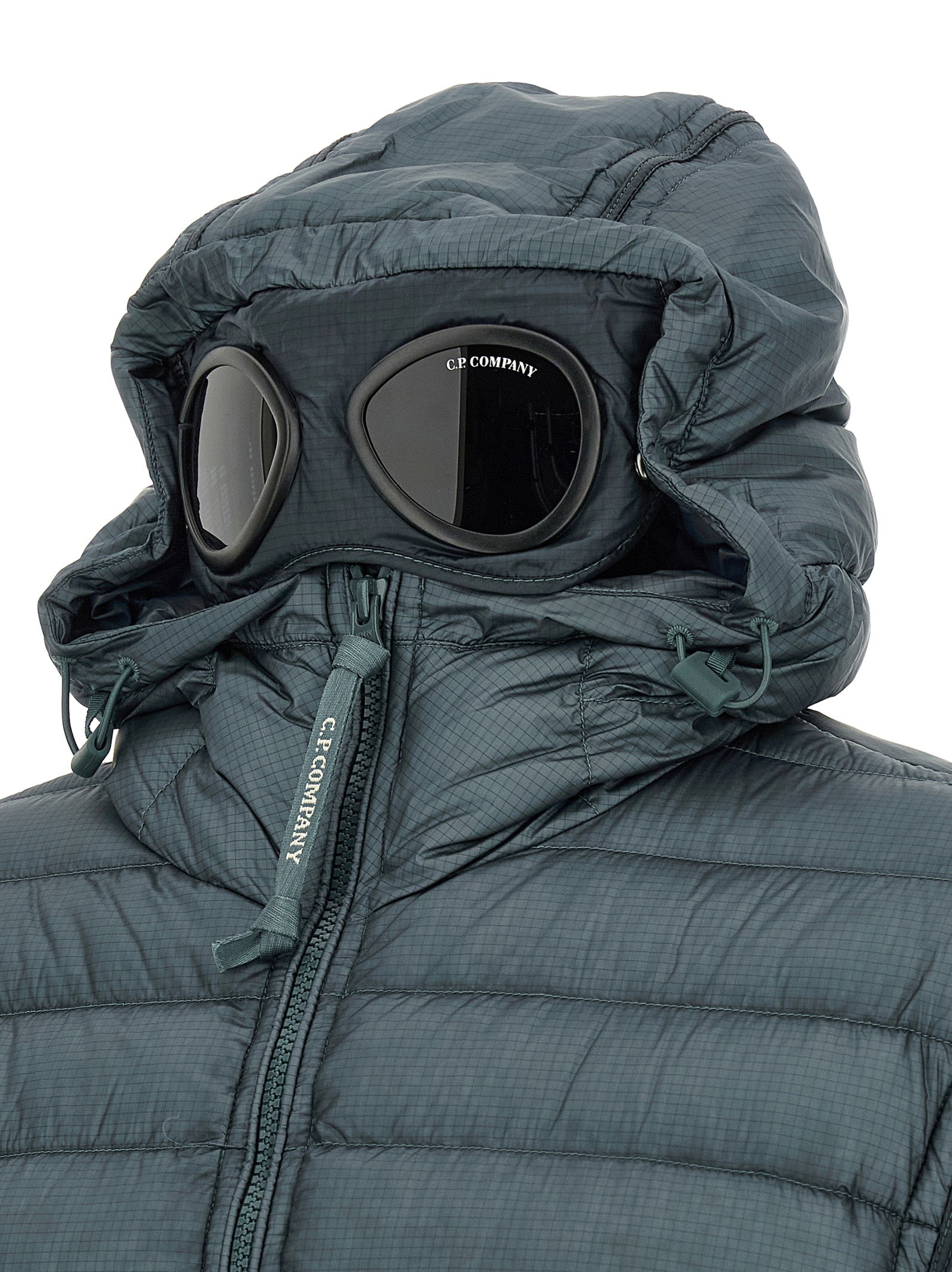 Hooded Puffer Jacket by C.P. Company for men in polyamide blue & teal features a city-ready silhouette, detailed with hooded & insulated and a city-ready .