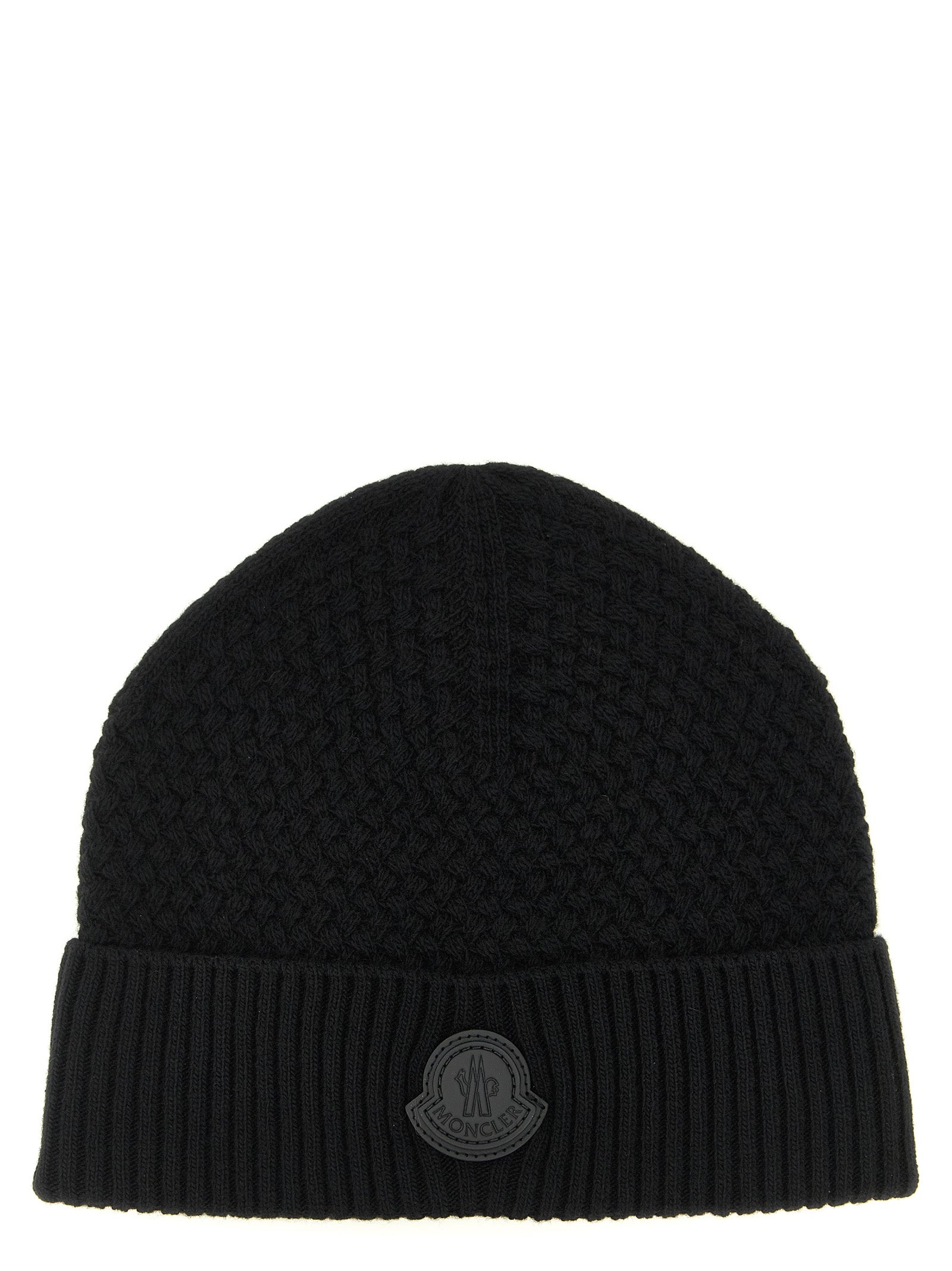 Beanie Hat by Moncler for men in cashmere wool & leather black features a distinguished knit construction, showcasing the sophisticated silhouette and distinguished finish of the Cashmere Wool & Leather Beanie Hat.