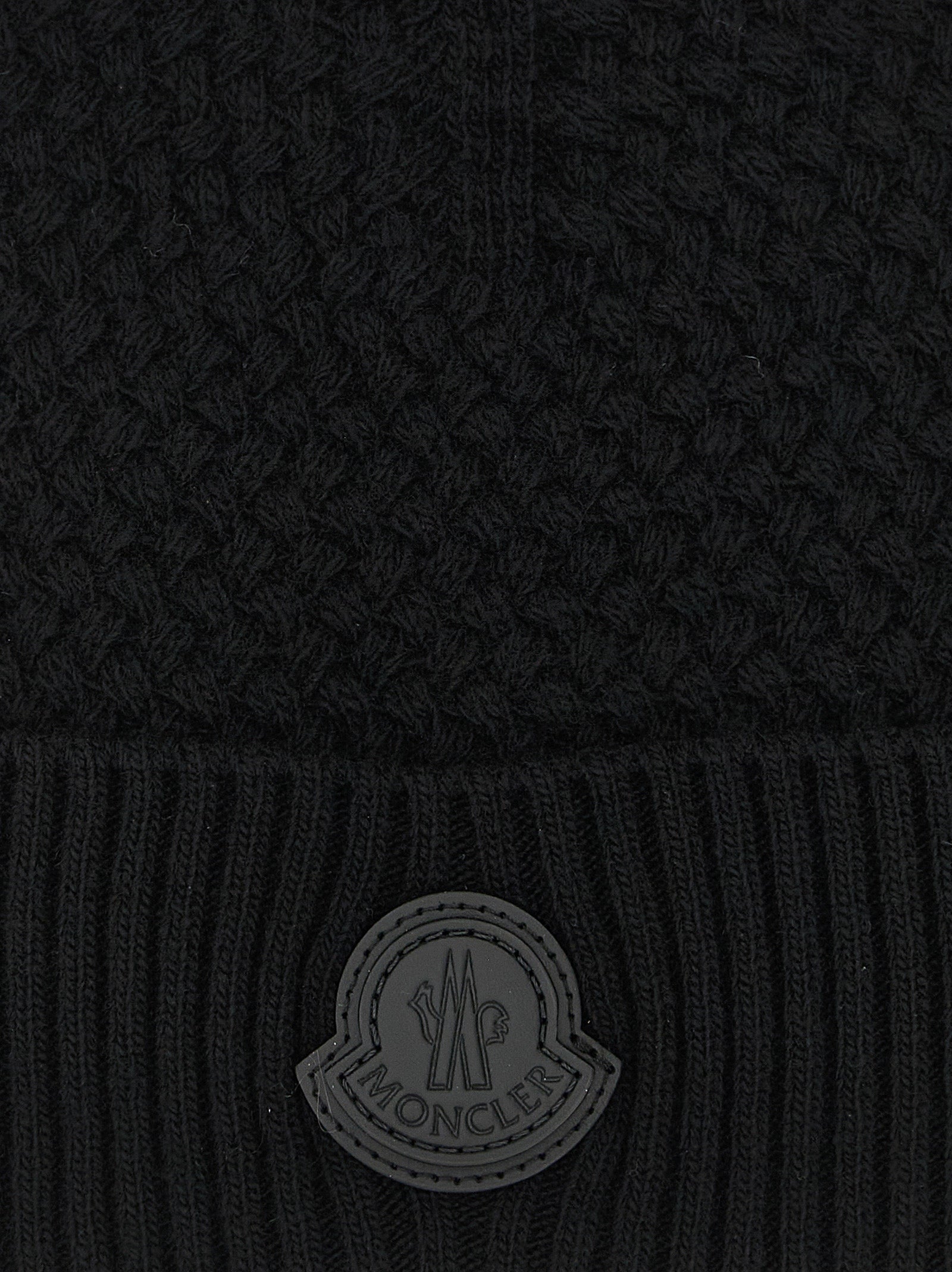 Beanie Hat by Moncler for men in cashmere wool & leather black features a athleisure-luxe silhouette, artfully capturing the essence of the athleisure-luxe Cashmere Wool & Leather Beanie Hat design for a sophisticated look.