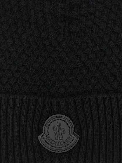 Beanie Hat by Moncler for men in cashmere wool & leather black features a athleisure-luxe silhouette, artfully capturing the essence of the athleisure-luxe Cashmere Wool & Leather Beanie Hat design for a sophisticated look.