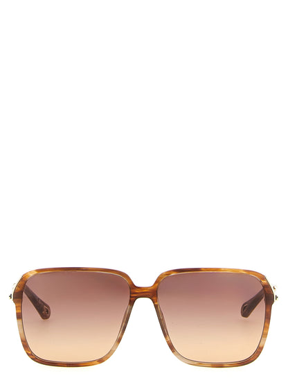 Sunglasses by Chloé for women in lambskin leather gradient, brown & gold features an effortlessly chic square frame design with brown coloured frame detailing and gradient lens for a effortlessly chic aesthetic.