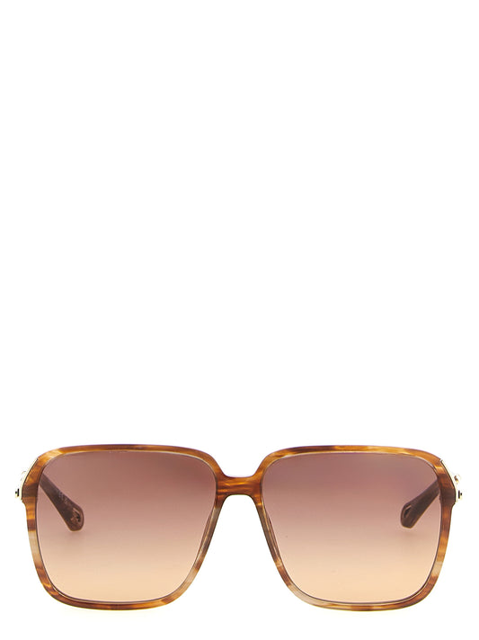Sunglasses by Chloé for women in lambskin leather gradient, brown & gold features an effortlessly chic square frame design with brown coloured frame detailing and gradient lens for a effortlessly chic aesthetic.