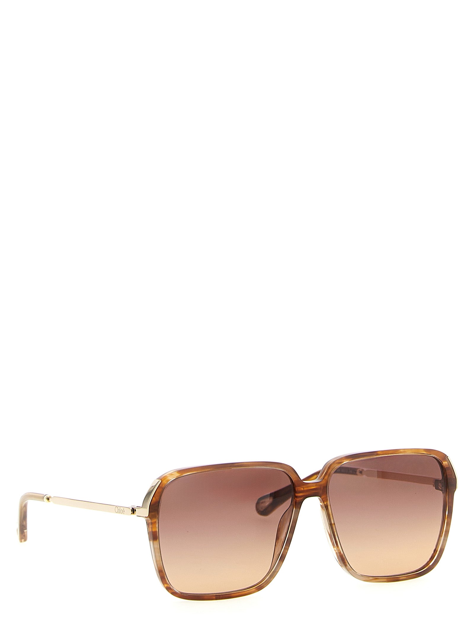 This Sunglasses by Chloé for women in lambskin leather gradient, brown & gold presents a sumptuous silhouette, showcasing a sumptuous square frame design in brown coloured frame and high-performance gradient lens.