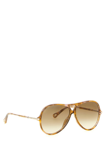 Sunglasses by Chloé for women in lambskin leather and gradient, bicolour, amber, gold & yellow presents a enviable silhouette, featuring and aviator frame design with gradient lens for a enviable look.