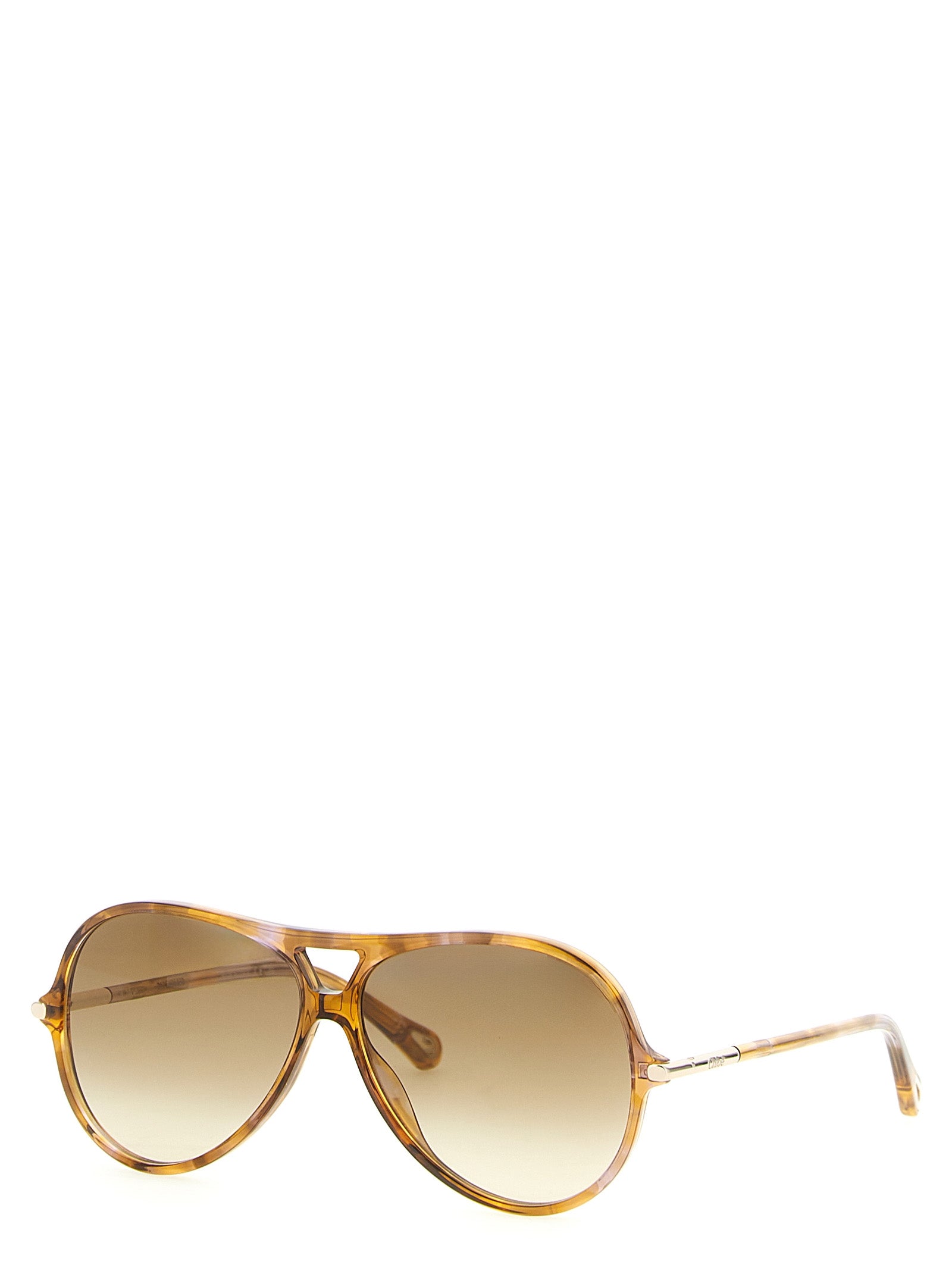 Sunglasses by Chloé for women in lambskin leather gradient, bicolour, amber, gold & yellow showcases a ethereal silhouette, featuring aviator frame design with gradient lens for a ethereal finish.