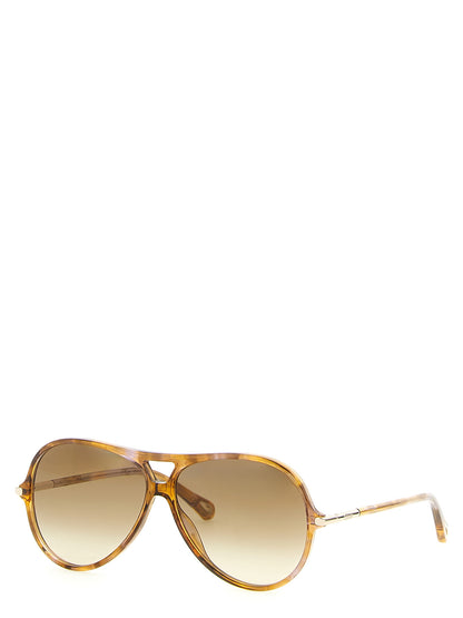 Sunglasses by Chloé for women in lambskin leather gradient, bicolour, amber, gold & yellow showcases a ethereal silhouette, featuring aviator frame design with gradient lens for a ethereal finish.