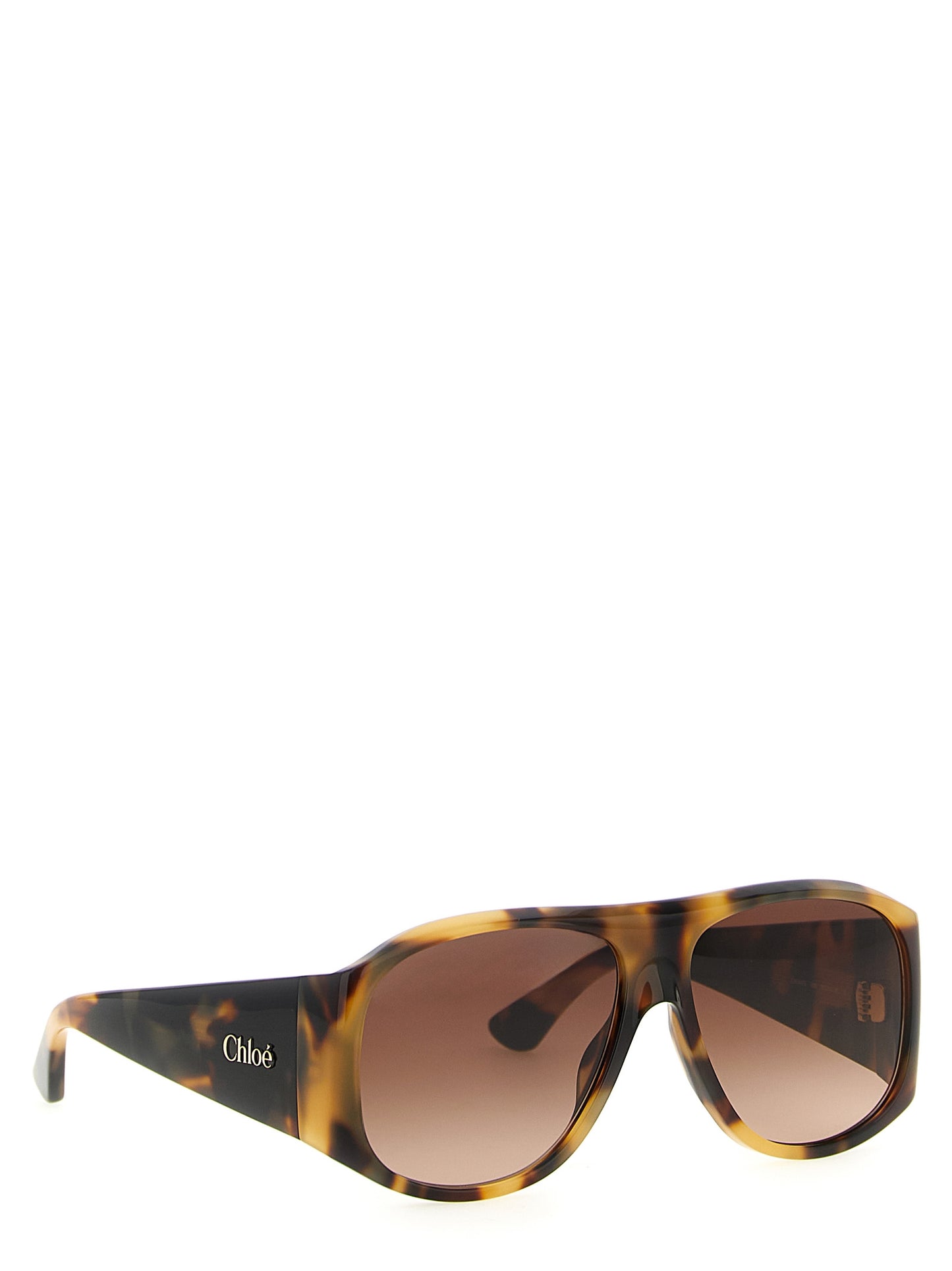 Sunglasses by Chloé for women in lambskin leather gradient, brown, gold & havana showcases a ethereal silhouette, featuring brown coloured frame with gradient lens for a ethereal finish.