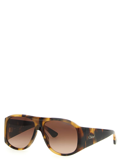 Sunglasses by Chloé for women in lambskin leather gradient, brown, gold & havana features a contemporary silhouette, showcasing a contemporary in brown coloured frame with high-performance gradient lens.