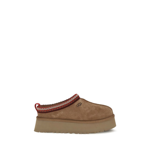 Mules Flat Shoes by UGG for women in eva polyester suede leather brown, natural & signature features an captivating silhouette, showcasing the captivating style of the Women's EVA Polyester Suede Leather Mules Flat Shoes with its distinct and refined .